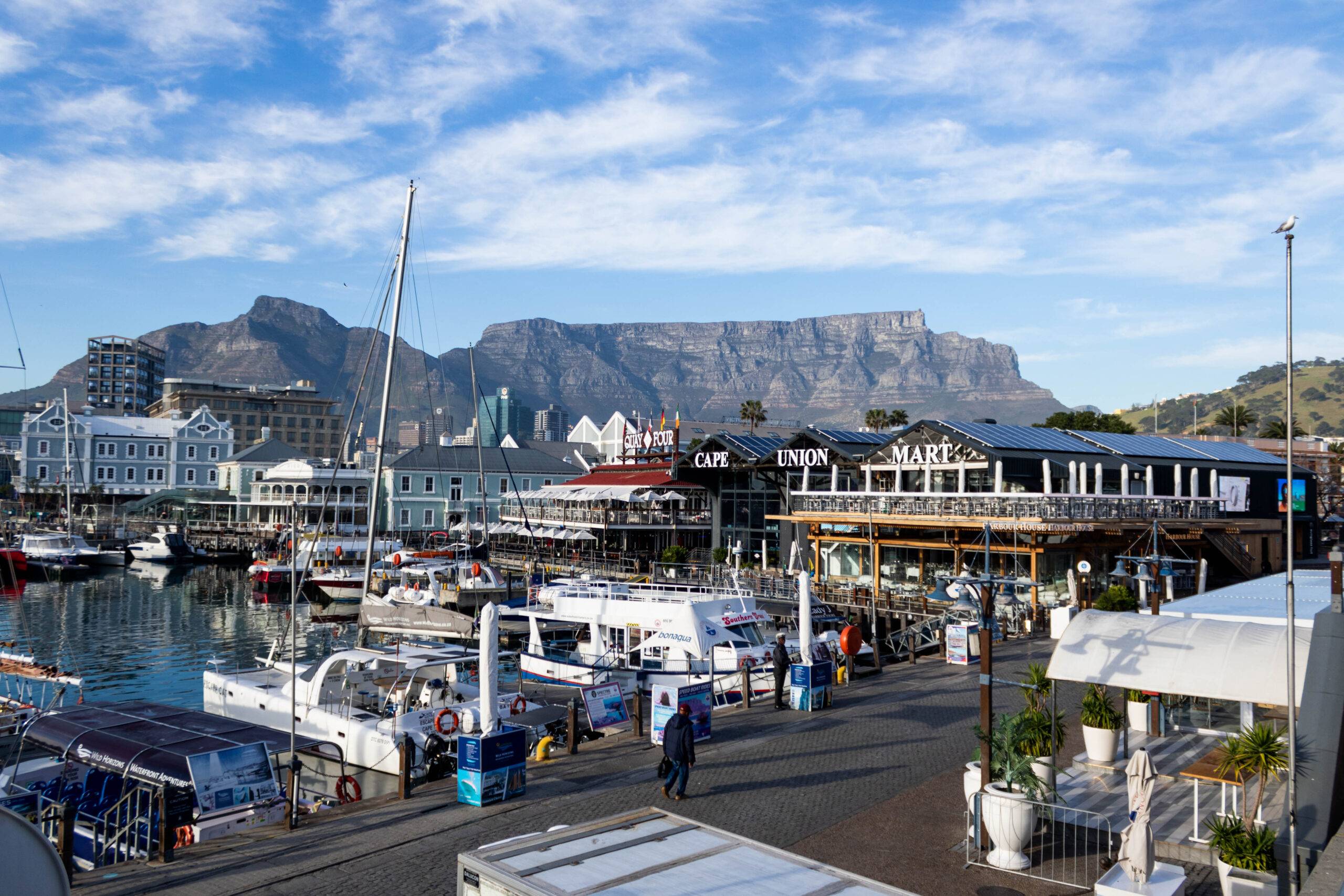 A gorgeous view of the harbor at Victoria Wharf with Table Mountain in the background